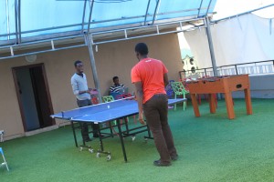 Rooftop ping pong is one of the many perks at the campus